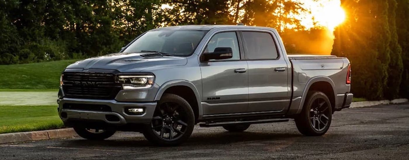 A grey 2022 Ram 1500 is shown from the side.