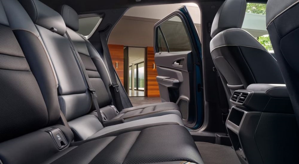 The rear black leather seats are shown in a 2024 Honda Prologue Elite.