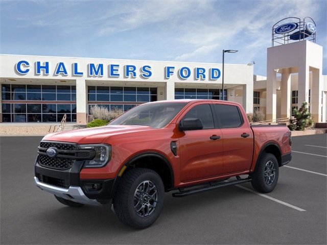 orange 2024 ford ranger truck parked at the Chalmers Ford dealership in Albuquerque, NM