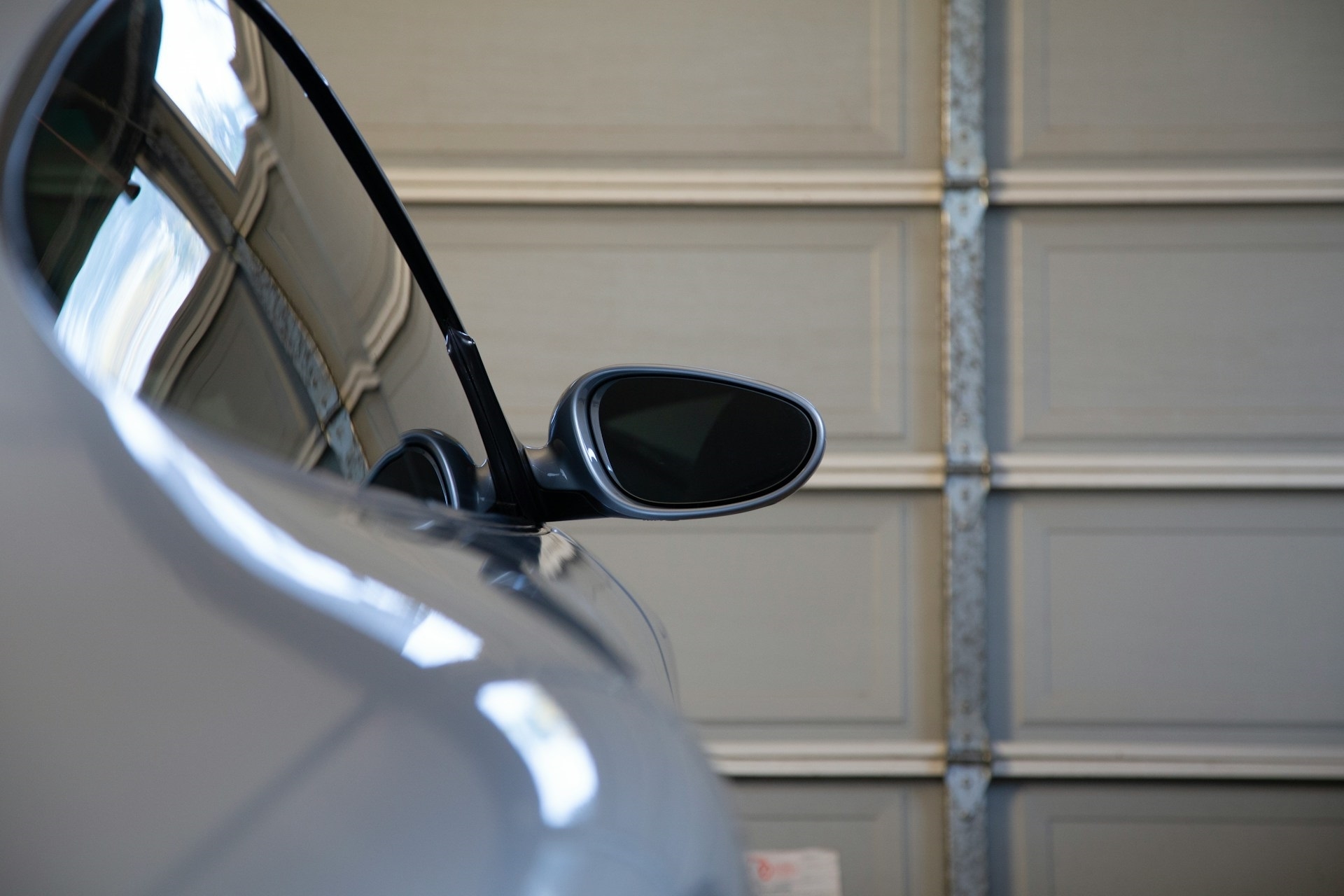 car parked outside of a closed garage door in mission viejo, ca