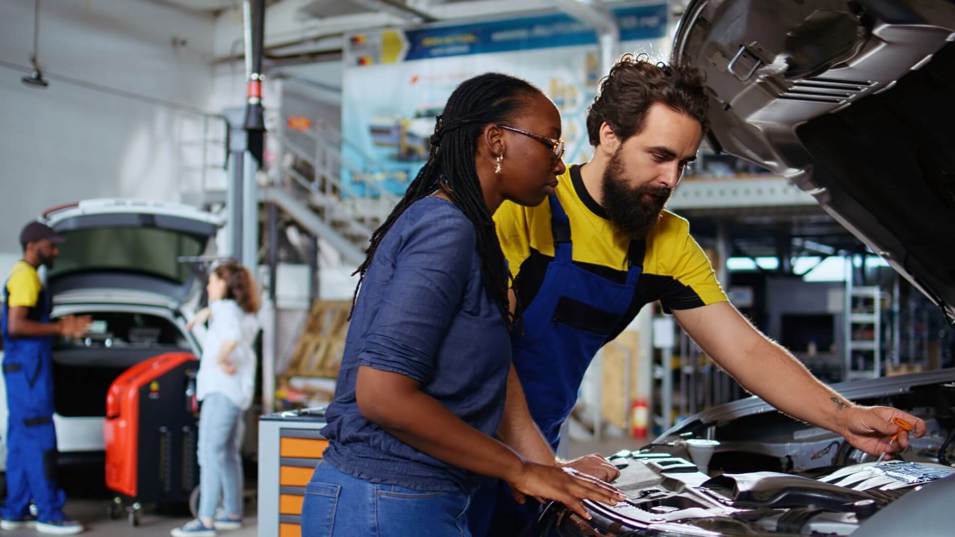 Service technician advising transmission fluid change on CVT transmission