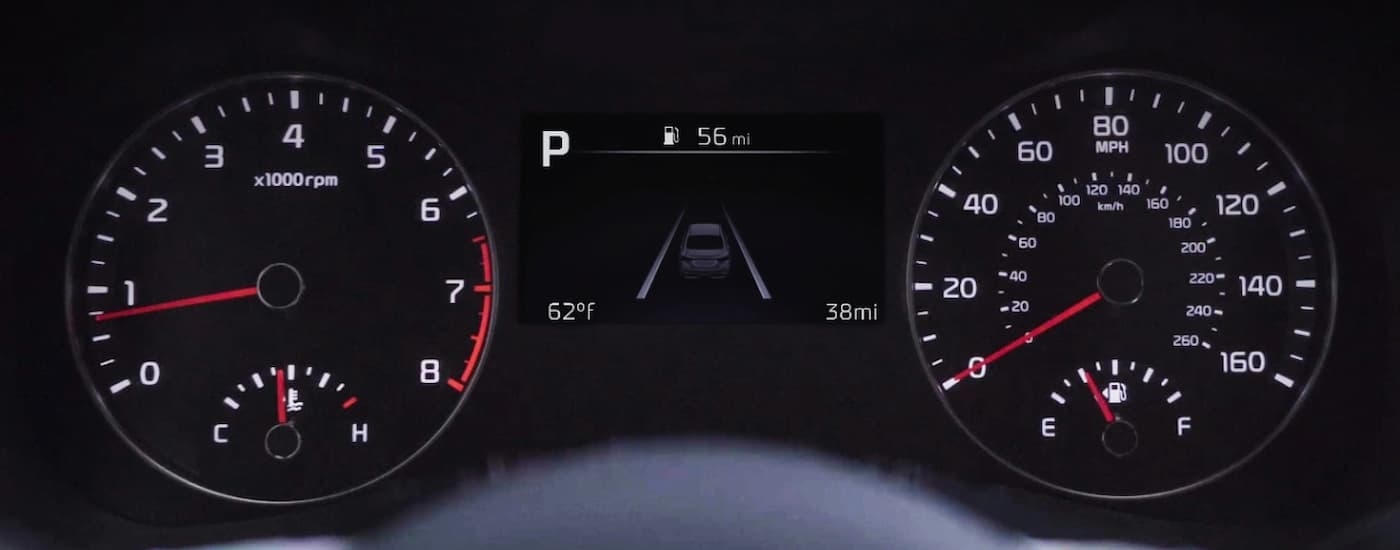 A close up of the gauge cluster in a 2024 Kia Forte.