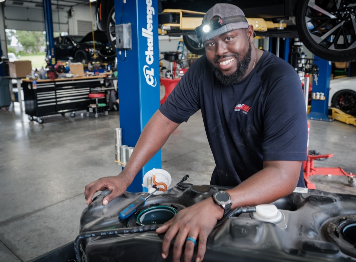 Technicians Working on Car