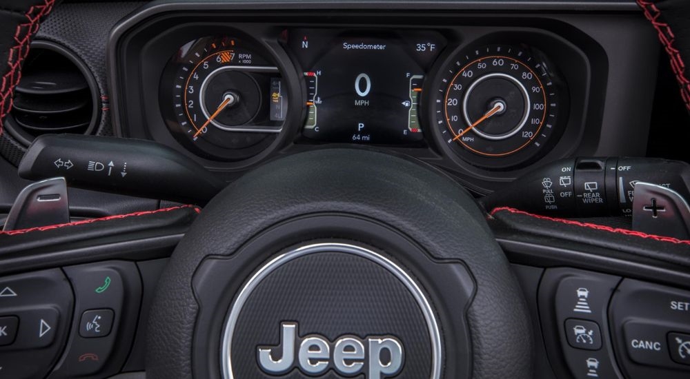 A close up shows the gauges in a 2024 Jeep Wrangler.