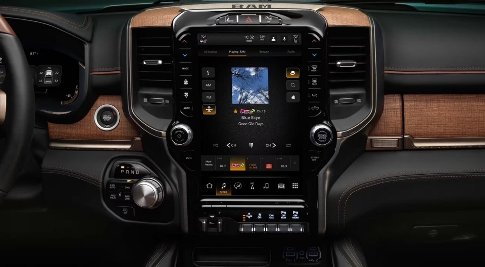 A close-up shows the infotainment system in a 2023 Ram 1500.