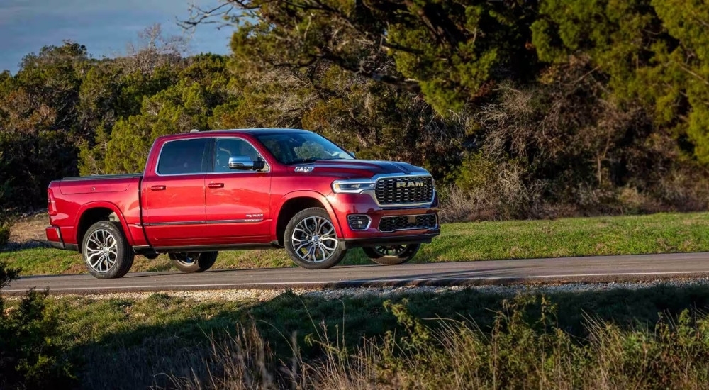 A red 2025 Ram 1500 Tungsten is shown aftter visiting a Ram dealership.