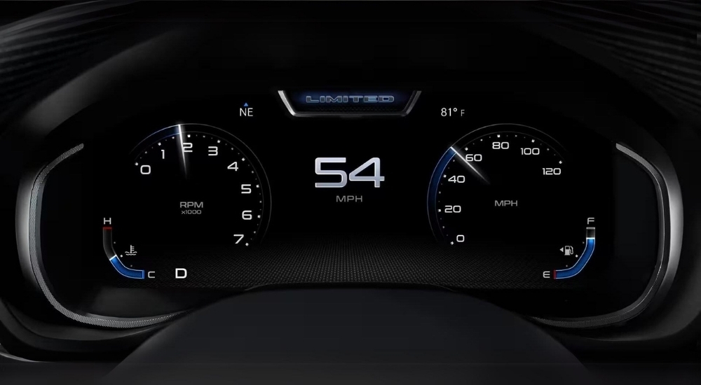 A close-up shows the digital gauge in a 2024 Ram 2500.