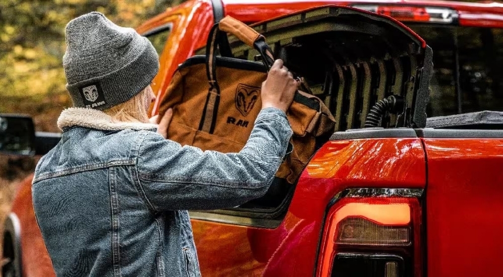 The Rambox cargo management system in a 2024 Ram 1500 is shown.