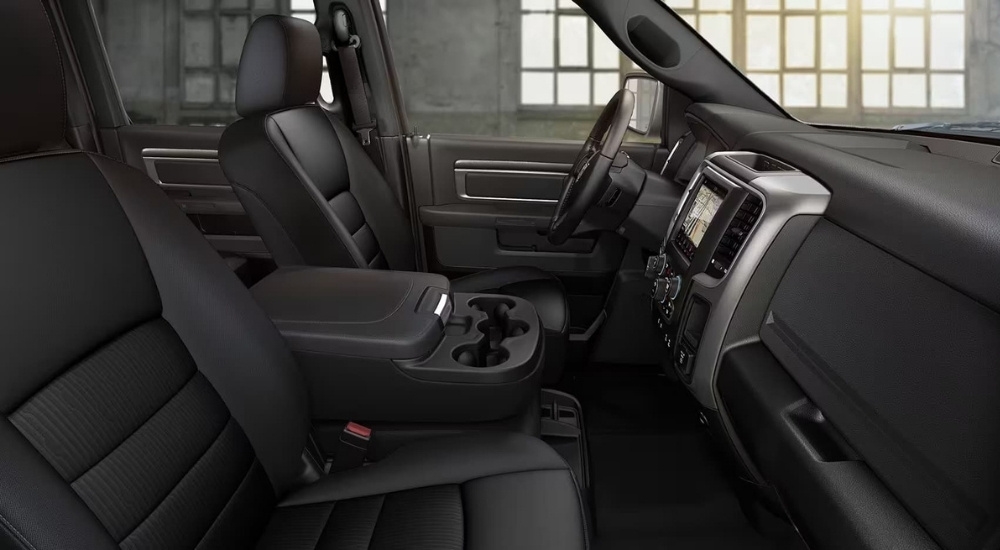 The black interior is shown in a 2024 Ram 1500 Classic.