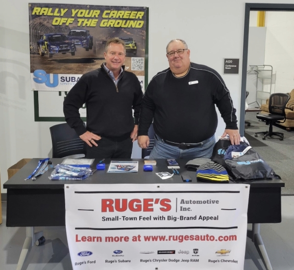 Two people at a Ruge's table.