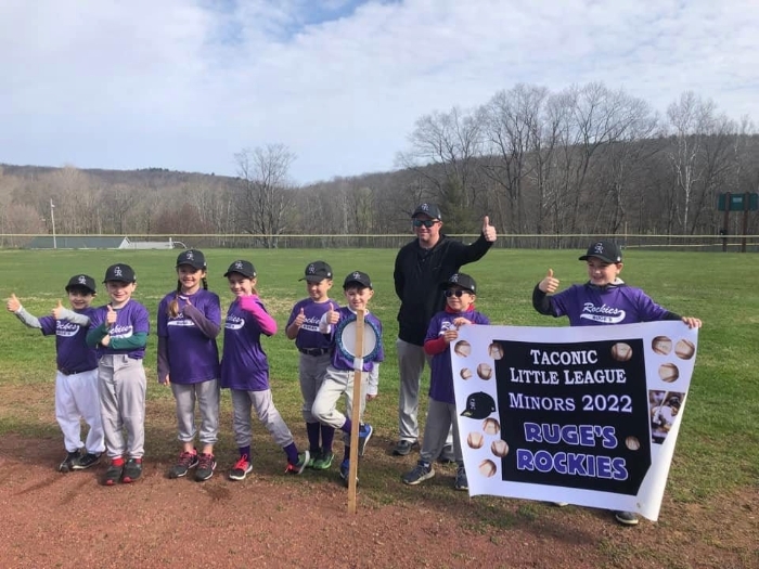 The Ruge's Rockies baseball team is shown.