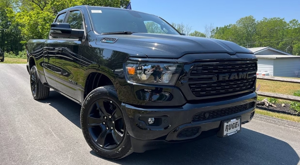 A black 2024 Ram 1500 is shown.