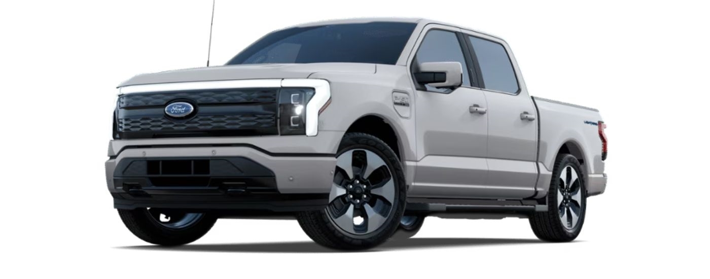 A grey 2023 Ford F-150 Lightning Platinum is angled left.