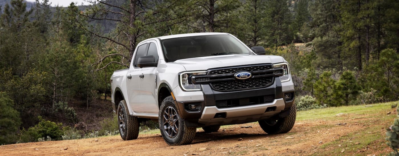 A white 2024 Ford Ranger XLT Sport is shown from the front at an angle.