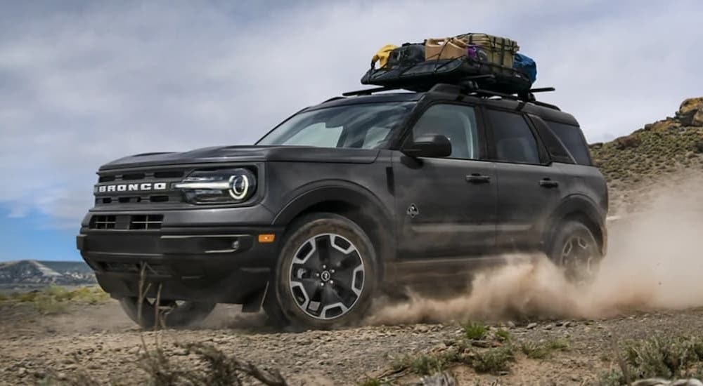 A grey 2024 Ford Bronco Sport is shown from the front at an angle after leaving a Ford Bronco Sport dealer.