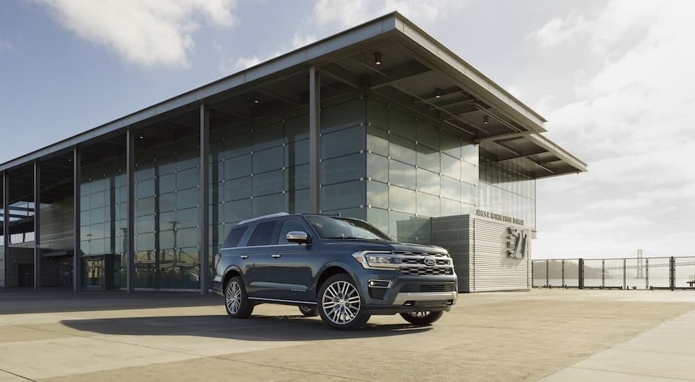 A black 2022 Ford Expedition Platinum is shown from the front at an angle.