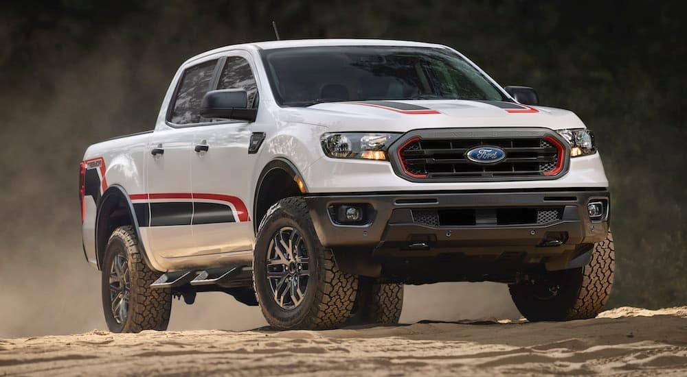 A white 2021 Ford Ranger Tremor is shown from the front at an angle after leaving a used Ford truck dealer.