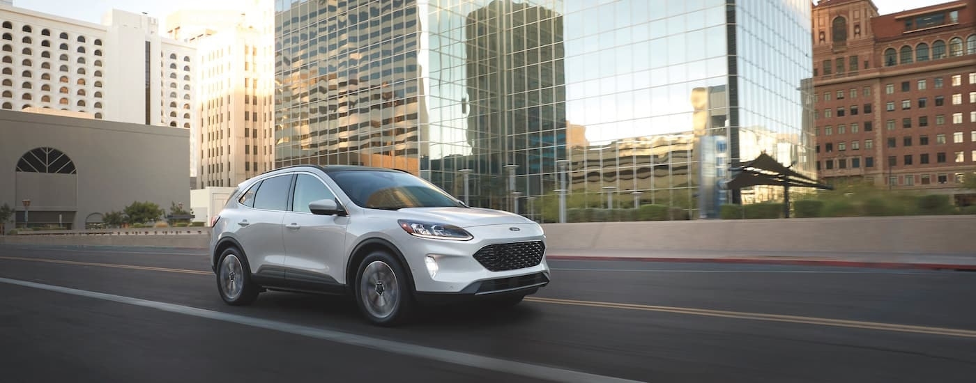 A white 2022 Ford Escape is shown from the front at an angle after leaving a guaranteed credit approval car dealership near me.