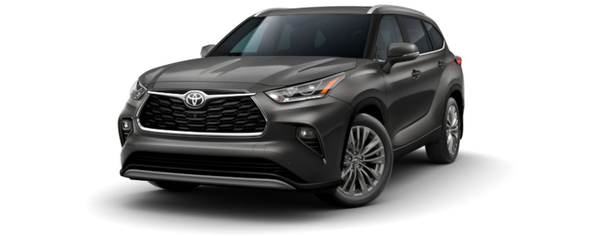 A dark grey 2023 Toyota Highlander Platinum is angled left.