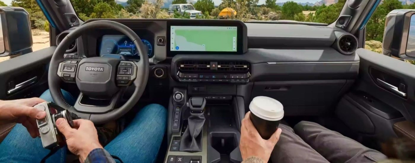 The infotainment screen and dash is shown in a 2024 Toyota Land Cruiser.