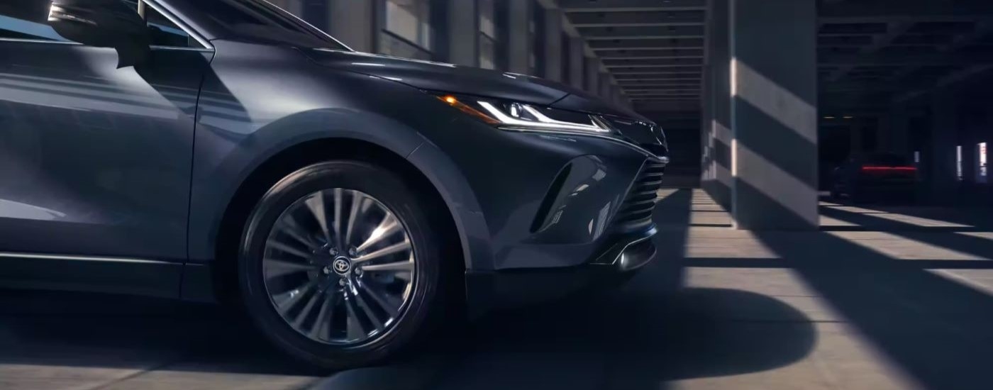 A close up shows the front of a 2023 Toyota Venza Limited in a parking garage.