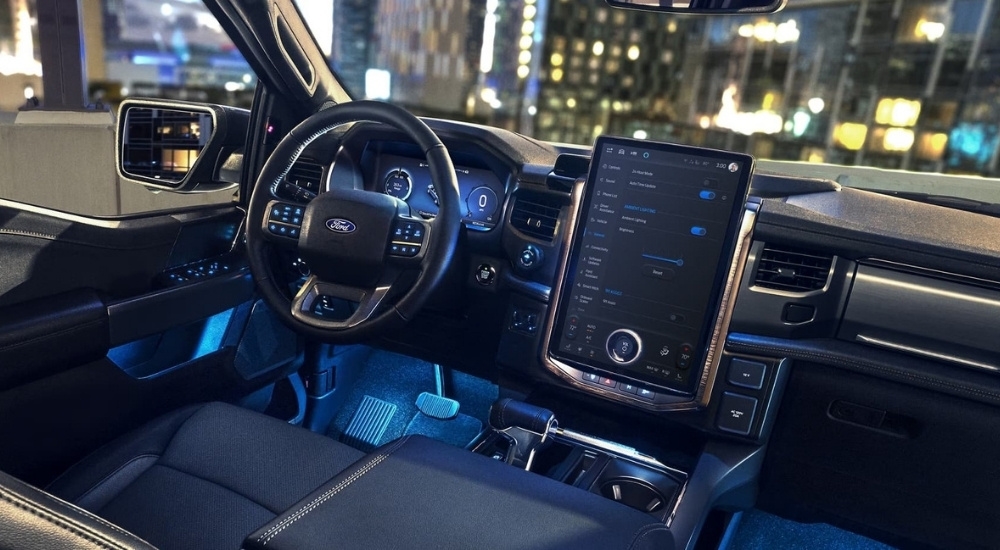 Blue ambient lighting is shown in a 2024 Ford F-150 Lightning.