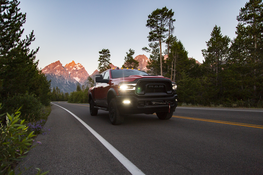 Used Ram 1500 driving through the mountains