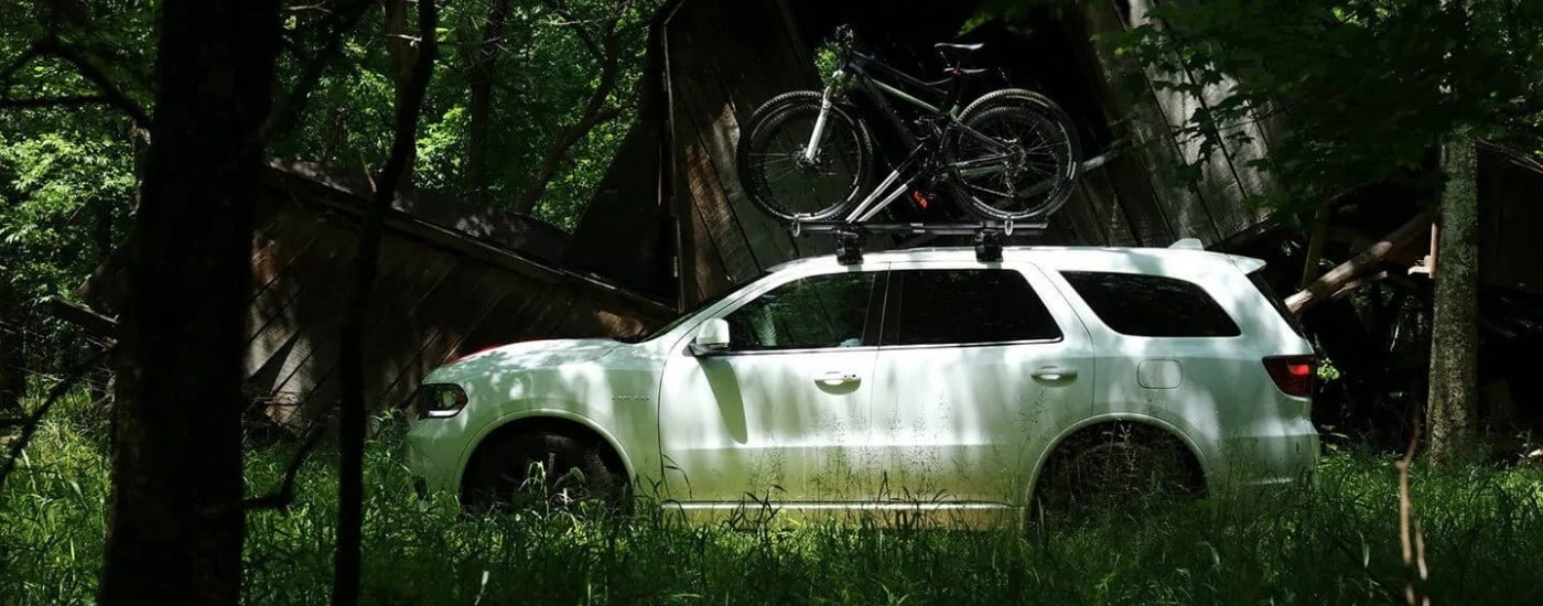 A white 2020 Dodge Durango is shown from the side off-road.