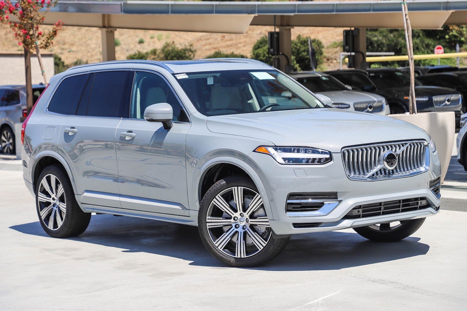 blue 2025 Volvo XC90 SUV parked at the Volvo Cars Mission Viejo dealership in mission Viejo, CA