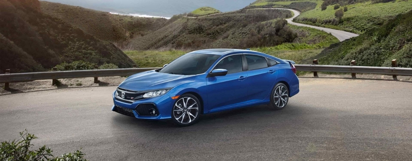 A popular used Honda for sale, 2017 Honda Civic Si, is shown on an empty parking lot.