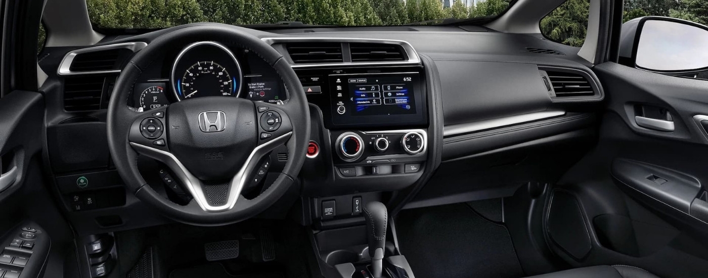 The black interior is shown in a 2020 Honda Fit.