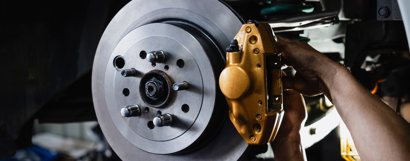 A mechanic performing brake service.