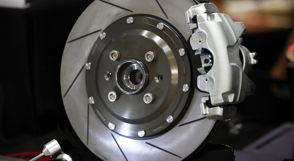 Close-up of slotted brake rotors.