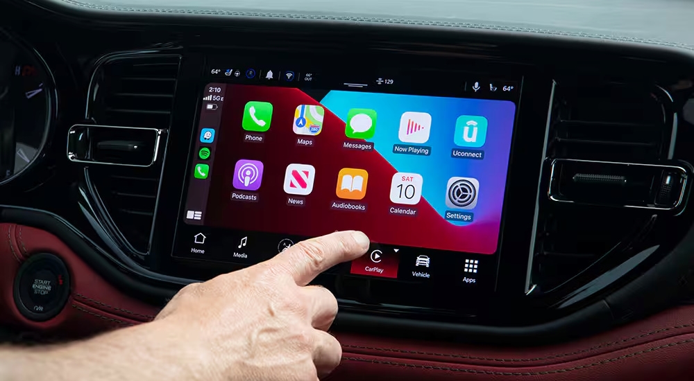 Close-up of the infotainment screen in a 2024 Dodge Durango at a Dodge dealer in Poughkeepsie.