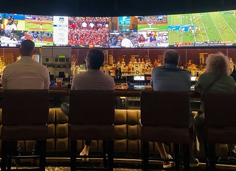 people sitting at a sports bar in Albuquerque, NM