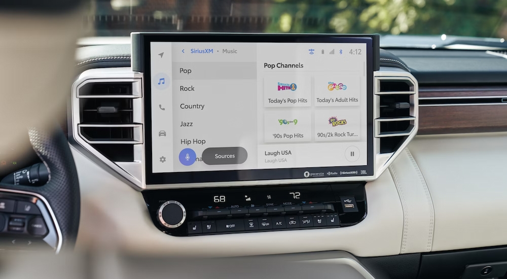 Close-up of the infotainment screen in a 2025 Toyota Tundra at a Toyota dealer near White River Junction.