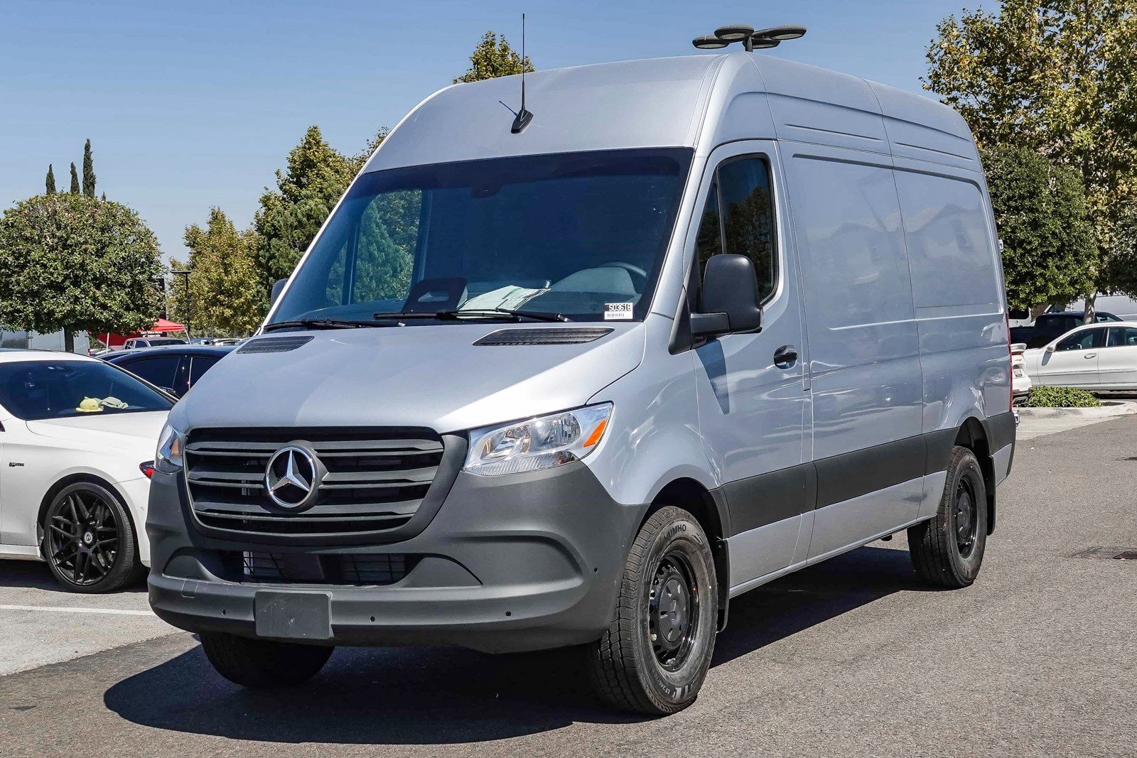 grey 2025 Mercedes cargo van parked at the Mercedes-Benz of Temecula dealership in Temecula, CA