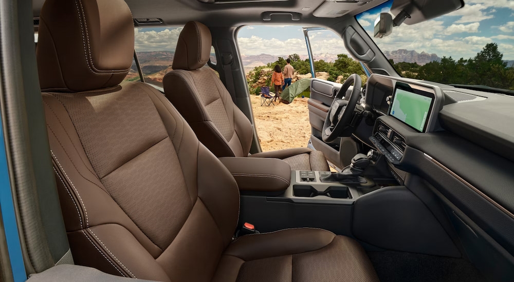 Side view of the brown interior cabin of a 2025 Toyota Land Cruiser.