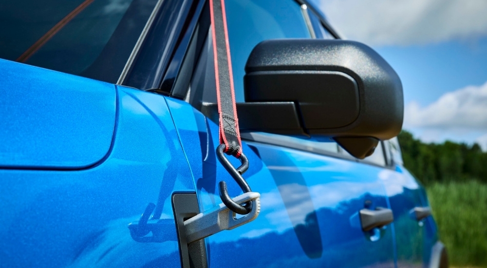 Close-up of one of the integrated tie-downs on a blue 2025 Ford Bronco Badlands Sasquatch.