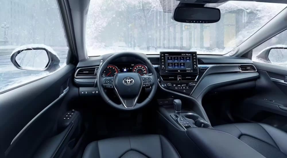 The interior of a 2022 Toyota Camry at a Toyota dealer near Eastchester.