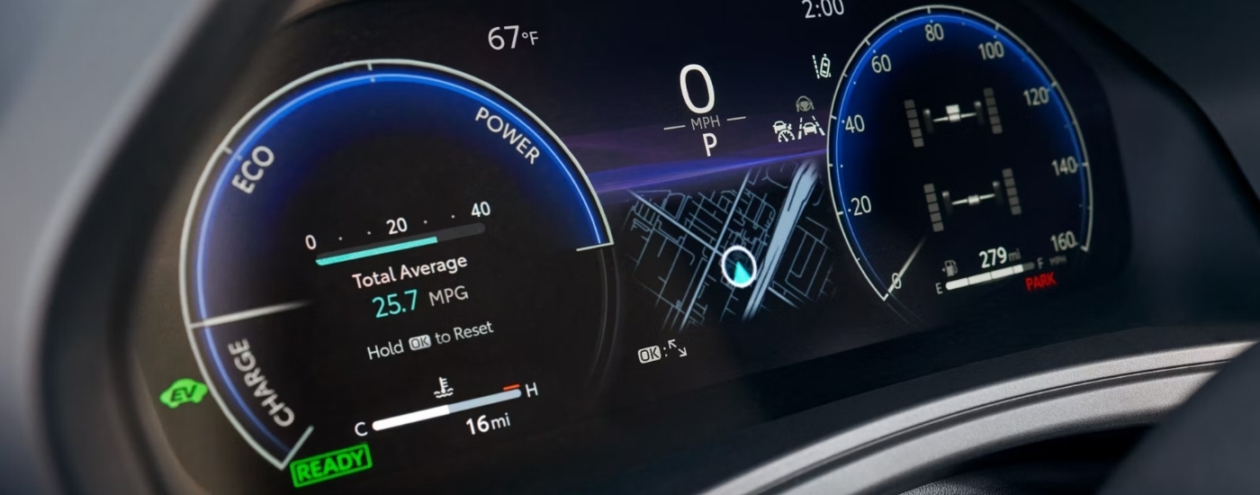 Close-up of the digital instrument cluster in a 2025 Toyota Grand Highlander for sale.