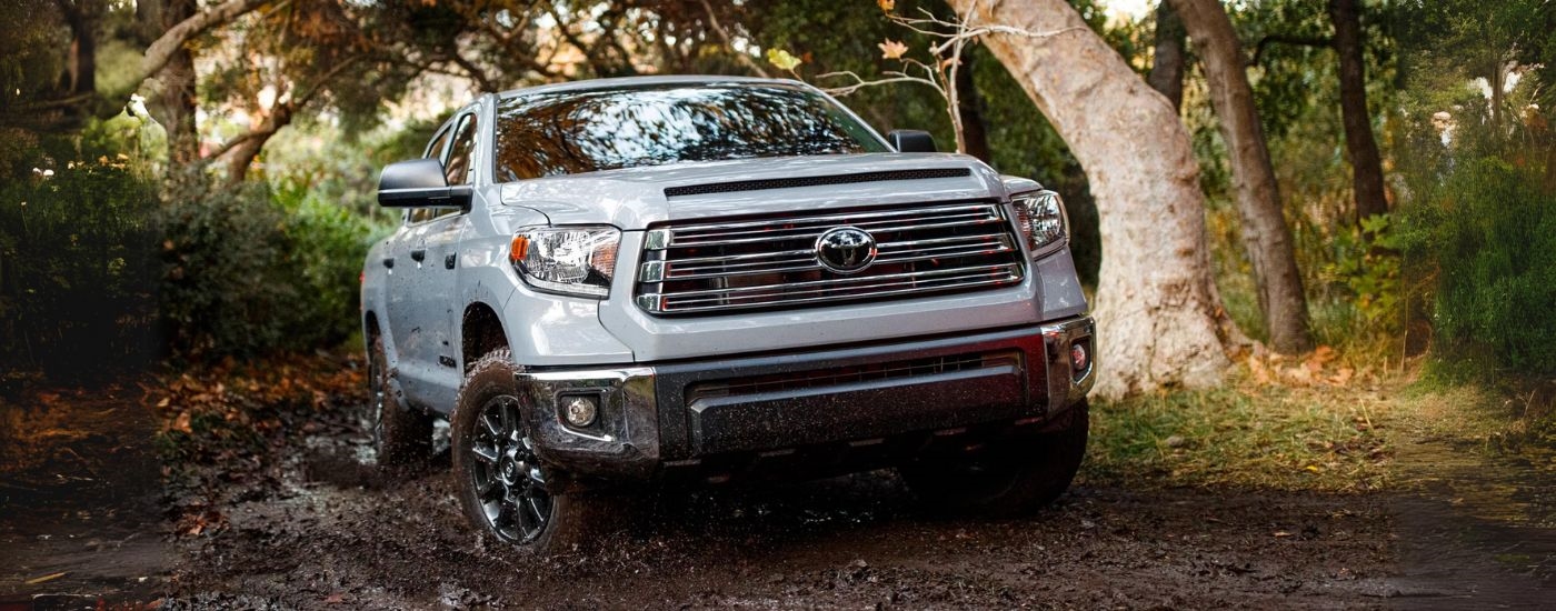 A silver 2021 Toyota Tundra for sale near Glasgow is shown off-road.