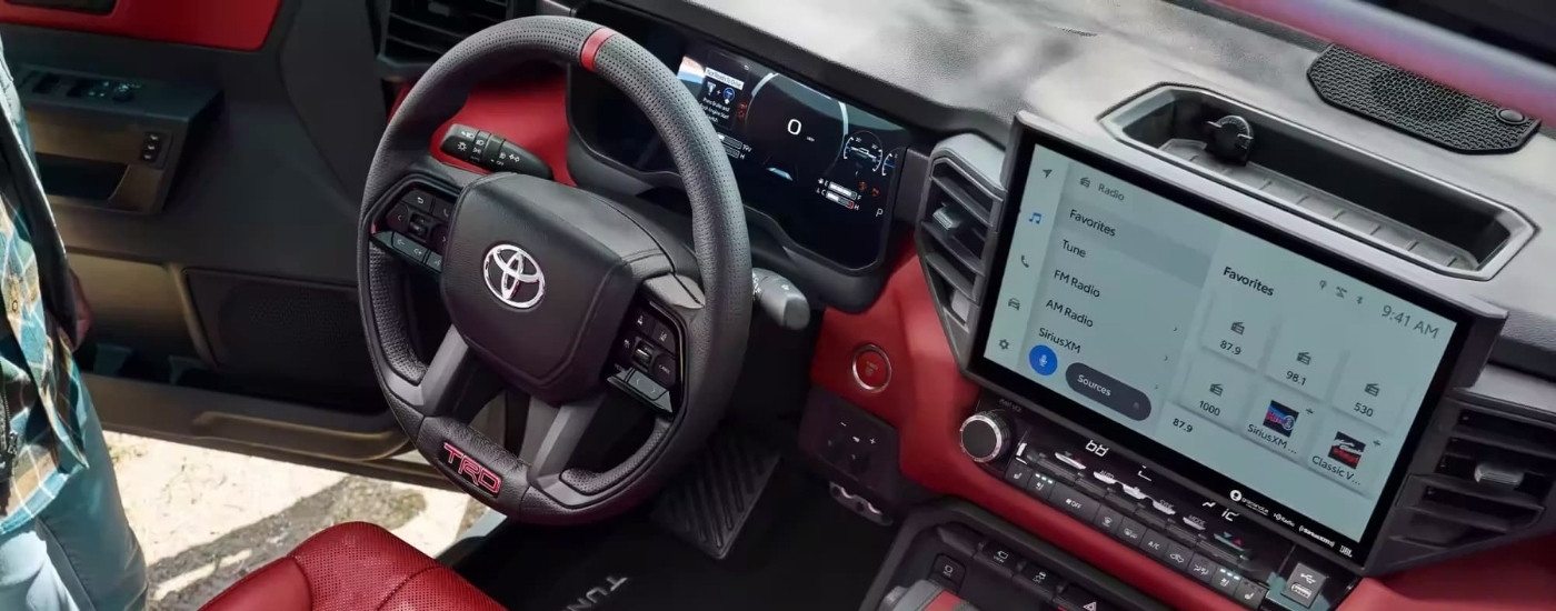 The black and red interior is shown in a 2023 Toyota Tundra TRD Pro.