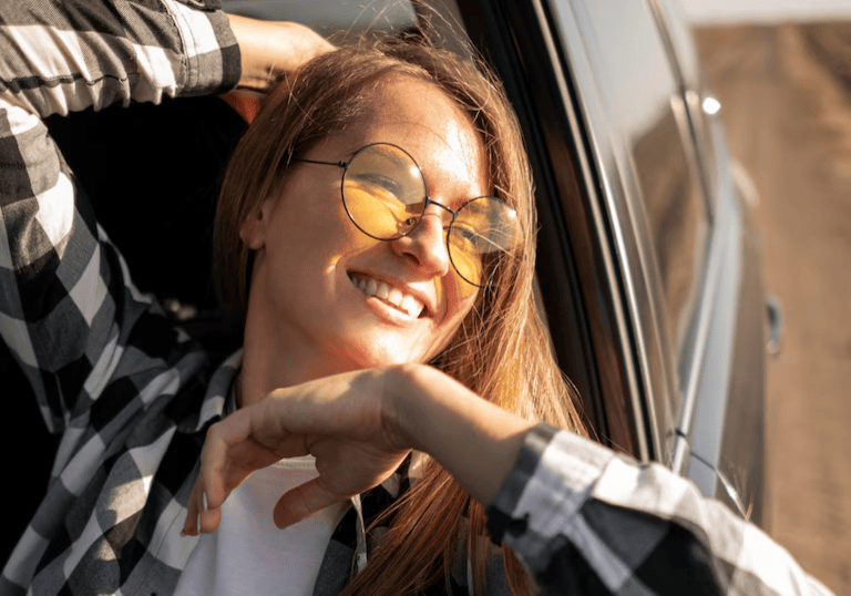 Happy driver in her Ford near East Bernard, TX