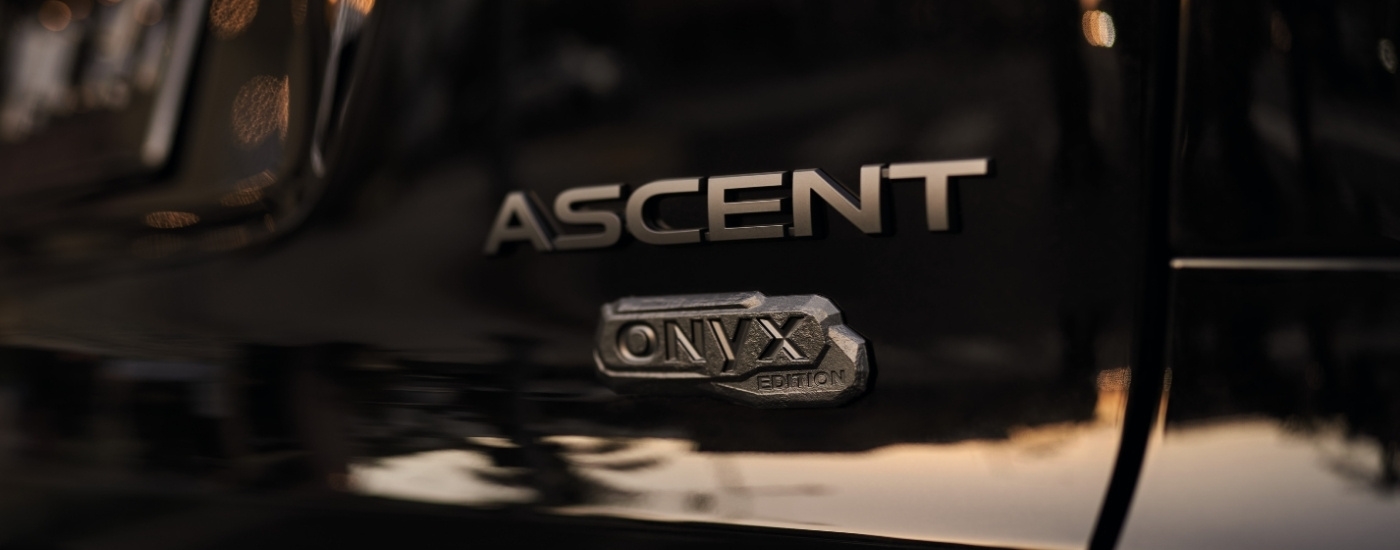 A close up shows the trunk badging on a black 2022 Subaru Ascent Onyx Edition.