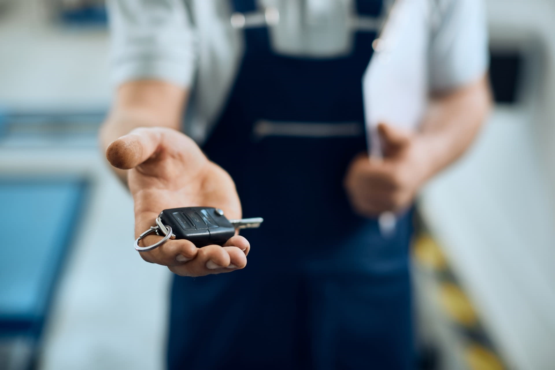 service tech with keys in hand