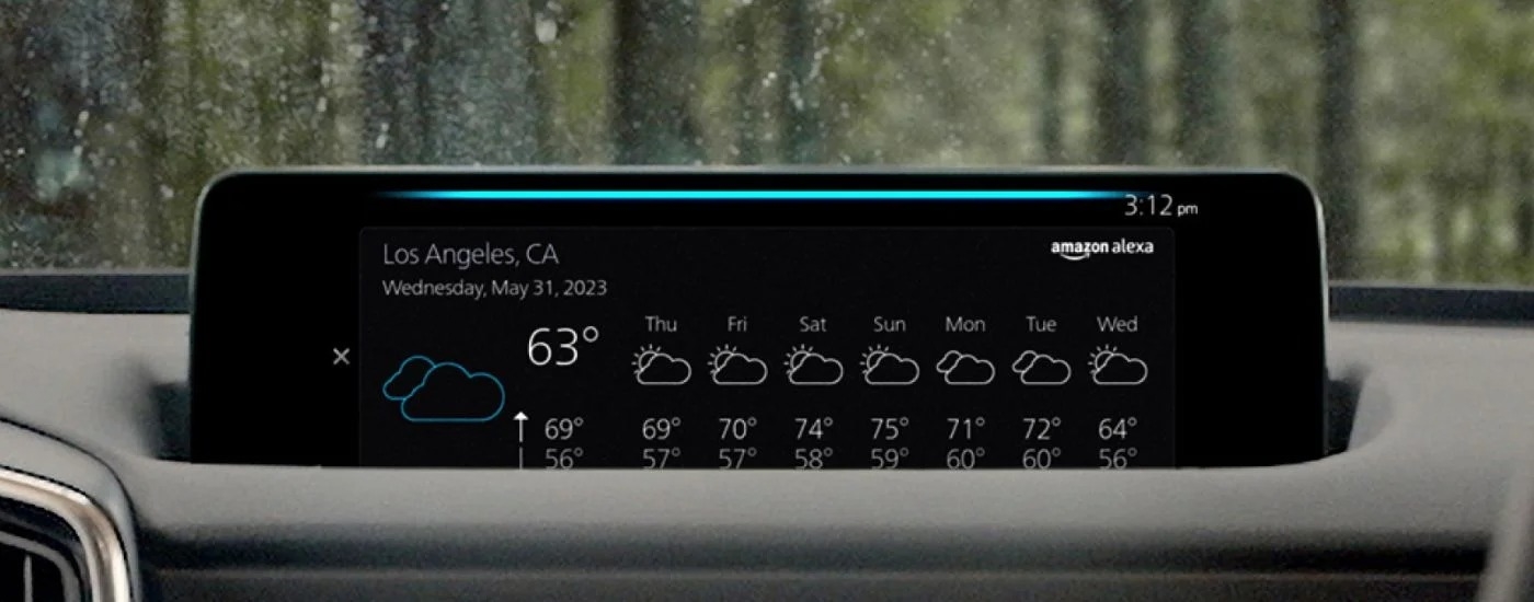 Close-up of the Alexa Built-in feature in a 2025 Mazda CX-50 for sale near Houston.