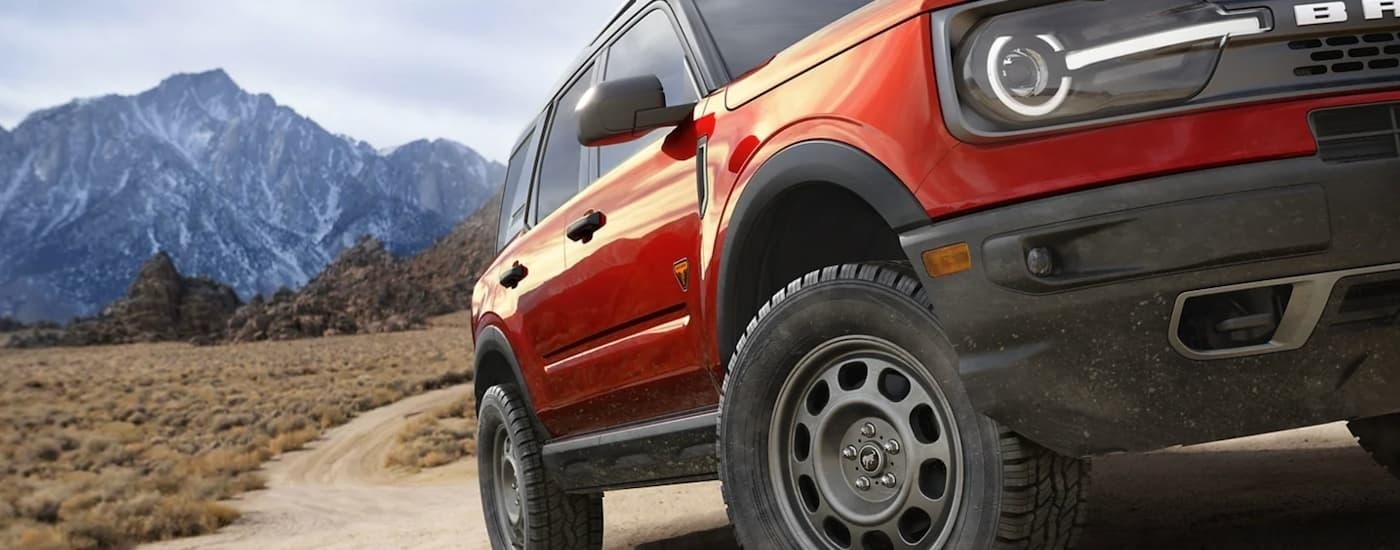 A red 2025 Ford Bronco Sport for sale is shown from the front at an angle.