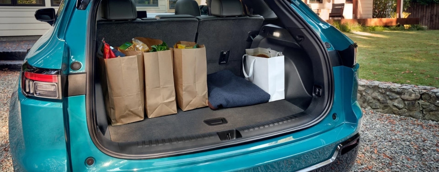 Groceries in the trunk of a teal 2024 Honda Prologue Elite.