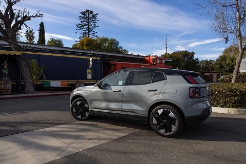 grey 2025 Volvo EX30 driving down a road in mission viejo, CA
